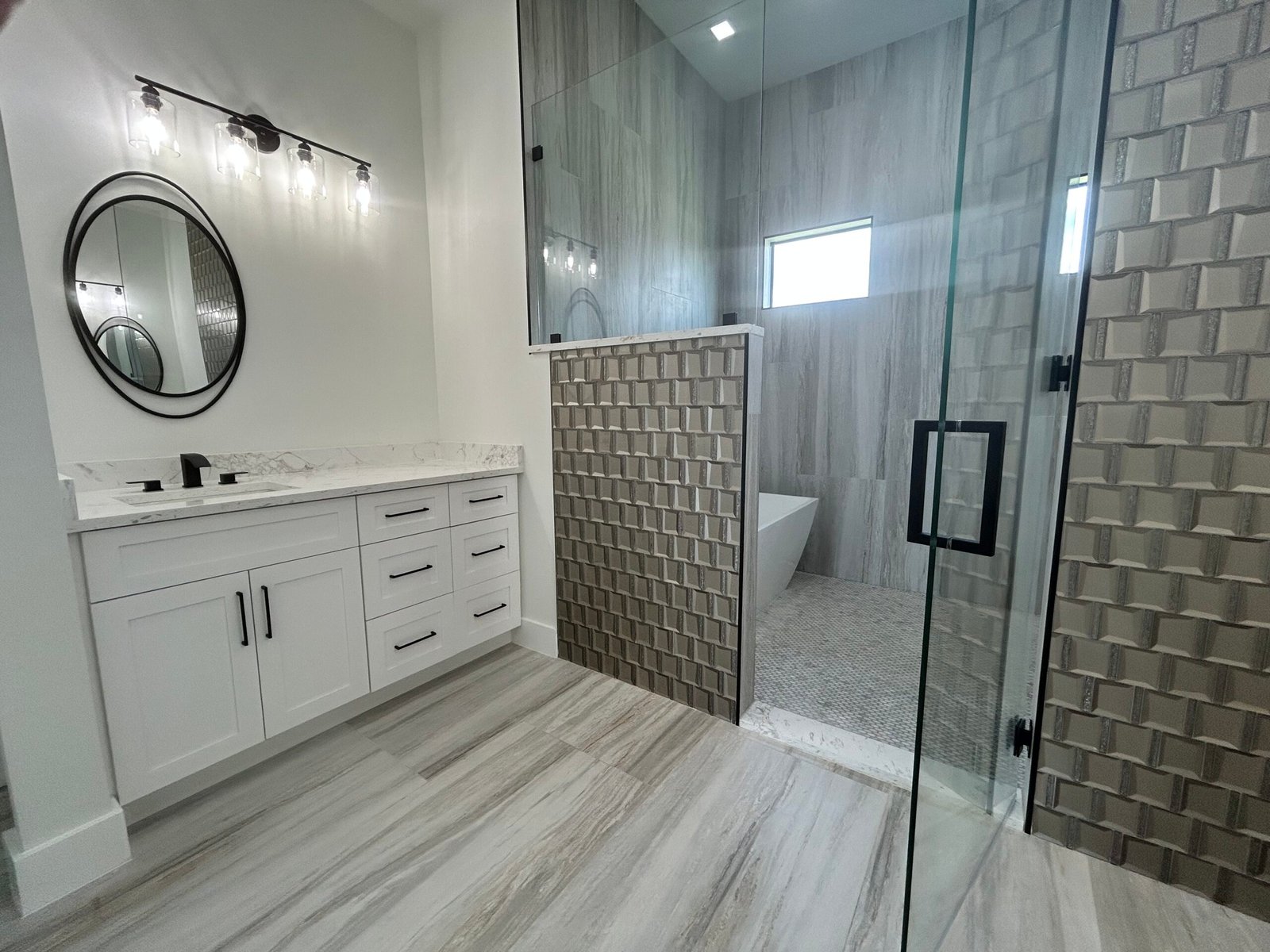 Immaculate living space with clean floors and kitchen view
